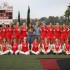 The 2014-2015 Lady Dons soccer team posing on the field at Manchester Stadium