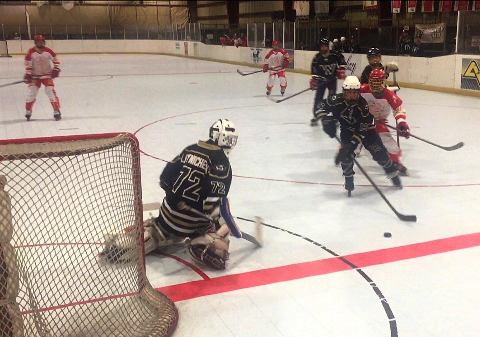 Westview High School's Josh Morrison '17 steals the puck from Cathedral Catholic High School's John Leone '16 11 minutes into the third period of the CIF championship match Wednesday evening. The contest marked the end of another fine season for the CCHS inline hockey team.
