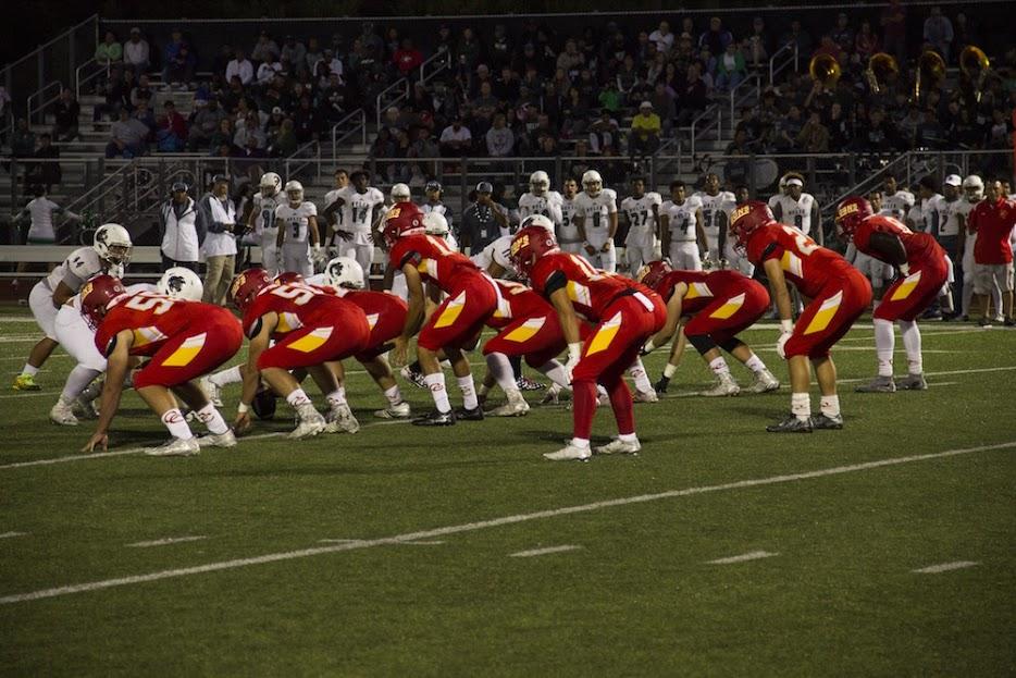 The Dons ready for the snap versus Helix High School earlier this year. CCHS, the No. 1 ranked team in the county, battles its rival Saint Augustine High School at 7 p.m. at San Diego Mesa College.