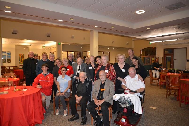 Monsignor Dickie (seated center) and the Monsignor Dickie Society at the inaugural fundraiser Monday night. 
