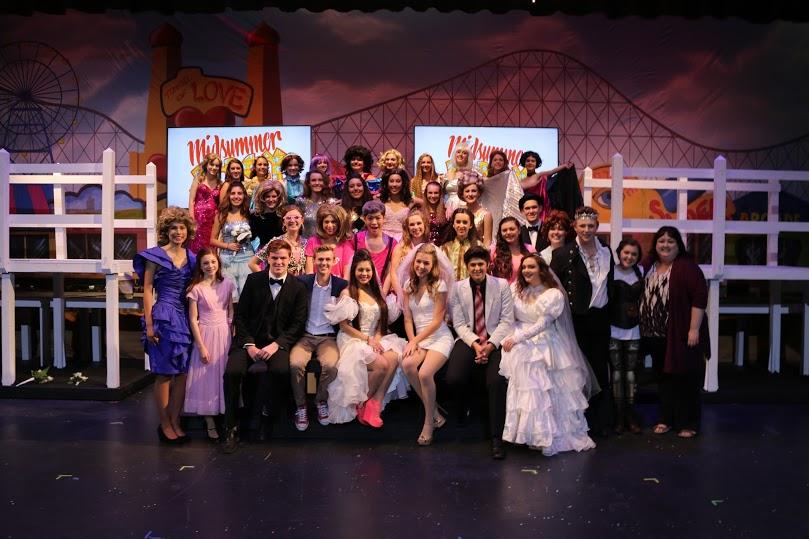 CCHS thespians join Ms. Katie Wilson on stage for one last picture after closing night of the schools most recent drama production. CCHS is planning significant changes to the Guadalupe Center thanks to generous recent donations.