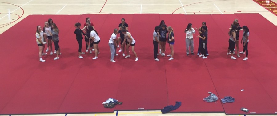 The CCHS varsity cheer team practiced one last time before leaving for a national competition in Las Vegas, where the squad took first place.