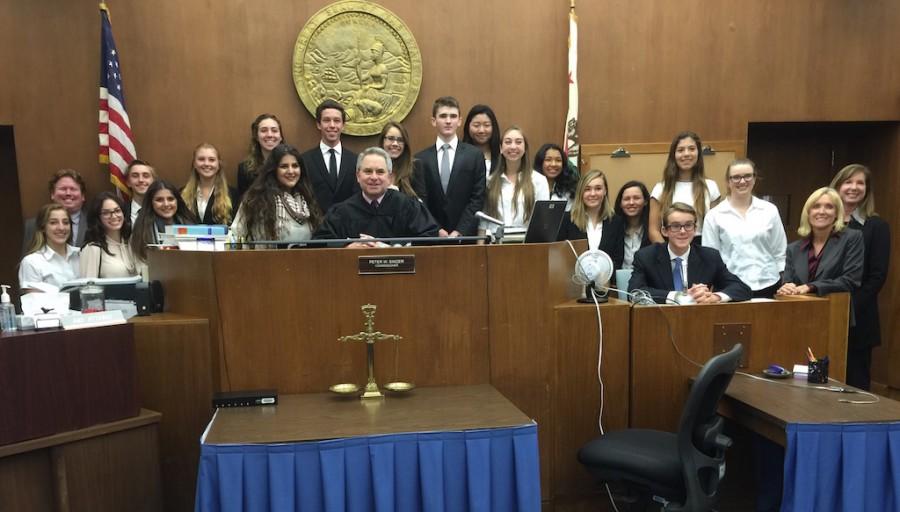 The mock trial team takes a final team picture at the last day of the competition with judge Peter Singer. While both the defense and prosecution for CCHS had a good run, the Academy of Our Lady of Peace ultimately secured the victory over all the teams in San Diego.