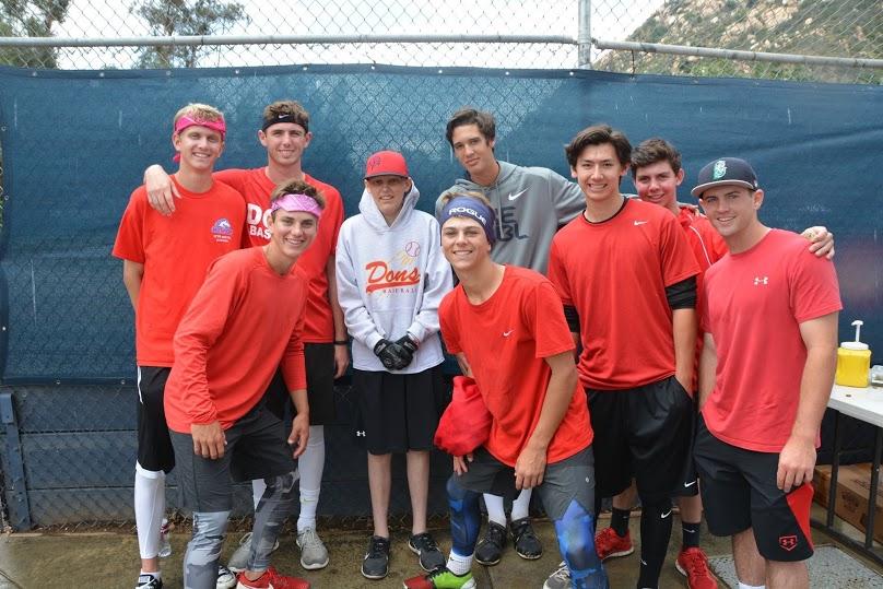 Brycen and some of the CCHS baseball players pose for a picture at the 1st Annual LyonHearted kickball tournament, honoring 17-year-old Jason Lyon who passed away from brain cancer in October. 