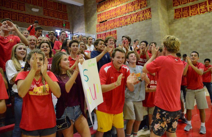 Los-Locos-leader-Matt-Goyette-17-gets-the-crowd-hyped-during-the-girls-varsity-volleyball-game-versus-Bishops-last-Tuesday.-Photo-by-Katin-Pesarillo