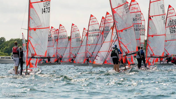 Ryan Ratliffe 17 sails a 29er boat in a sail team regatta.  He competes against other high school sail teams throughout San Diego.  All the boats are pushing toward the finish line in hopes of winning the regatta.