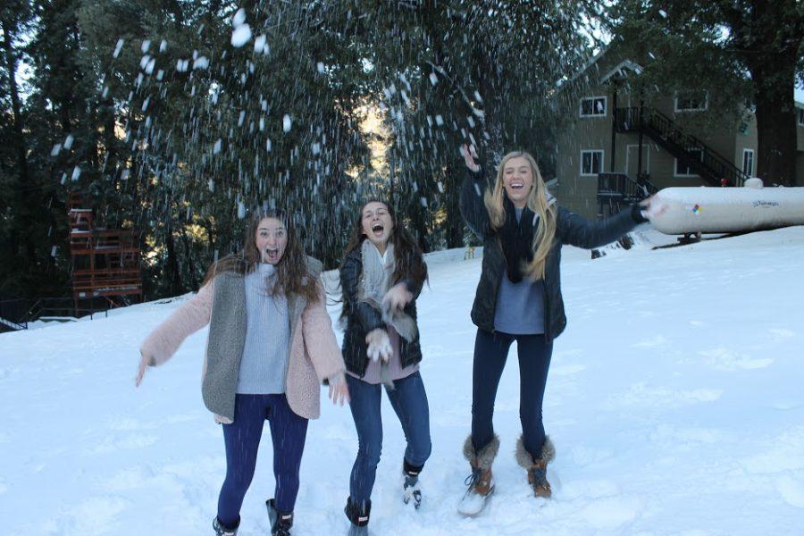 After reflecting on the importance of community and love at the recent Kairos 2 retreat in the Palomar Mountains, Cathedral Catholic High School students Sophia Battiata ‘17, Lauren Mammini ‘17, and Aerin Keeney ‘17 take a break by playing in the snow. Pope Francis issued an exhortation titled Amoris Laetitia that delivers an inclusive message of love.