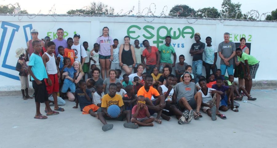 Gathering+with+locals+at+the+Pwoje+Espwa+Orphanage+in+Haiti+during+a+service+trip%2C+CCHS+students+dedicated+to+living+the+call+of+the+Project+One+club+demonstrate+their+commitment+to+global+service+efforts.