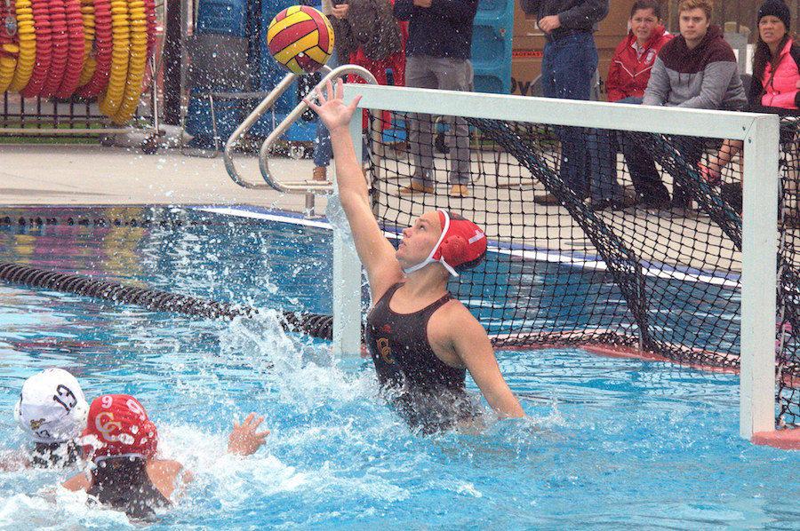 Hannah+Edwards+17+blocks+an+attempted+shot+in+a+recent+game.+She+will+attend+Hartwick+College+in+the+fall+on+a+water+polo+scholarship.