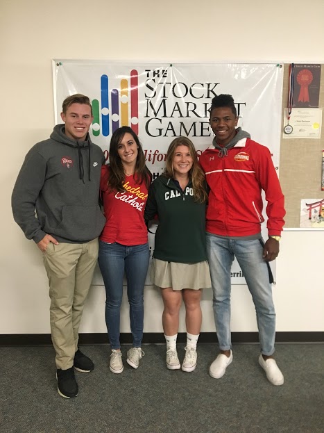 CCHS seniors (from left) Cameron King 17, Maddie LiMandri 17, Melanie Blum 17, and Ryan James 17 took home the bacon both semesters as winners of the Stock Market Game.