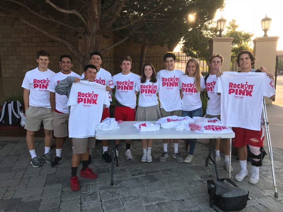 Brycen Newman 18 sports one of his T-shirts among friends, spreading awareness of breast cancer, which displays their commitment to help people who are in treatment. 