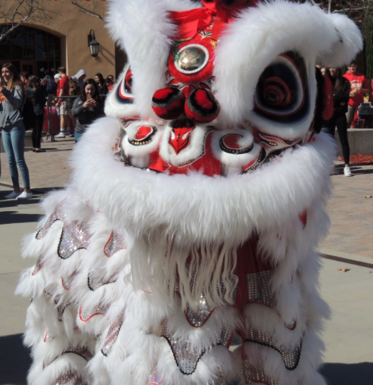 The San Diego Legendary Lion Dance Association performs during lunch in celebration of Chinese New Year.
