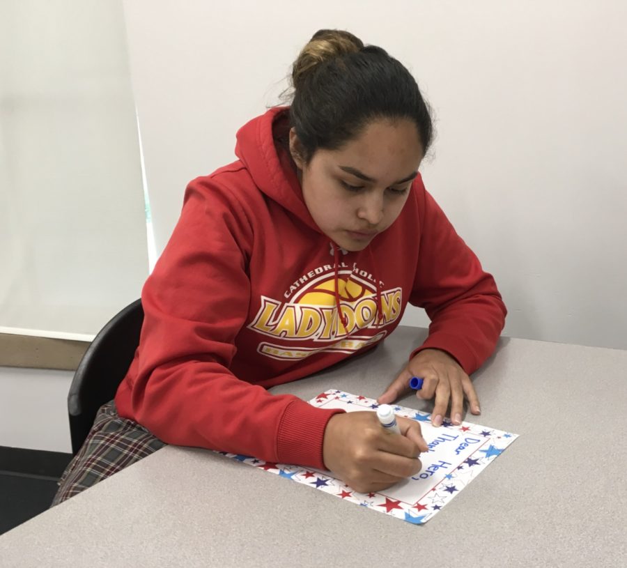 Rachel Carrillo 19 writes a letter during a Dons Thank Our Troops club meeting in order to show her support for those soldiers who have served. 