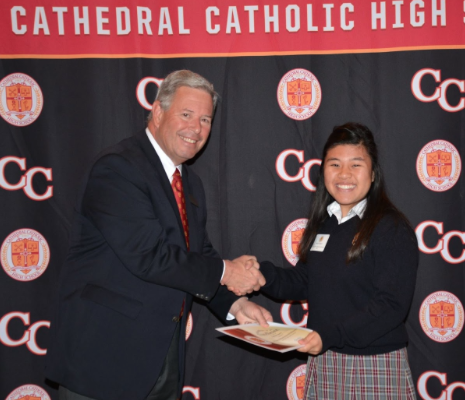 Paulina Nguyen ‘19 (right) receives the Barbara Gilshian Memorial Scholarship from CCHS President Stevan Laaperi  last week at the 2018 scholarship breakfast, where past and present recipients were acknowledged for their outstanding academic and service achievements. 

