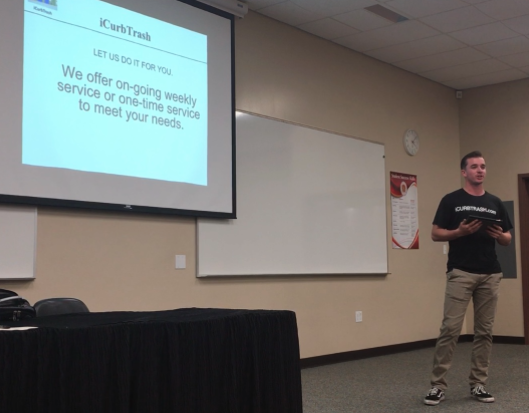 Joshua Sprague’18 introduces his business proposal icurbtrash to the judges at the recent Dons Shark Tank event.