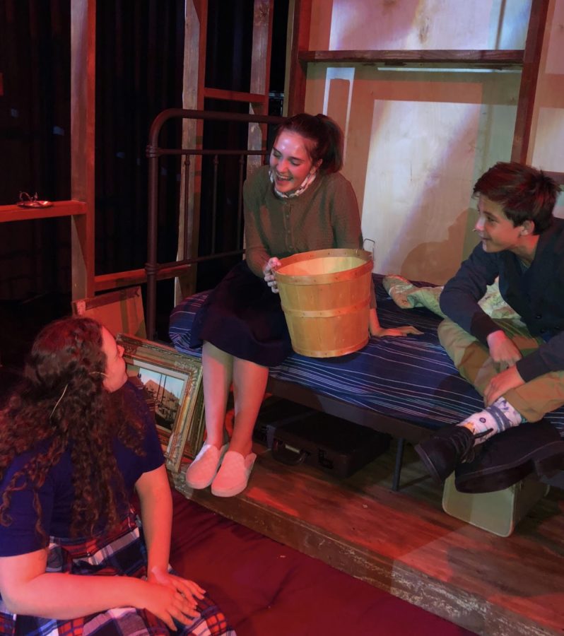 Kelsey Lyons ‘20, Mia Devins ‘20, and Maximo Nichols ‘22 rehearse a scene as their three characters have a conversation in Anne’s room, helping to lighten the mood of the play as a whole.