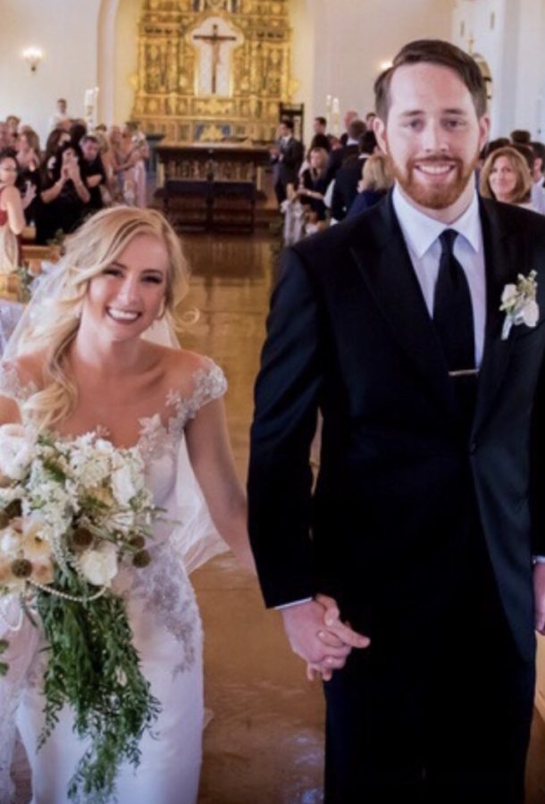 Current CCHS teachers Mrs. Amber Elliott and Mr. Kevin Elliott hold hands after their wedding ceremony on April 16, 2016 at St. Gabriel’s Catholic Church.