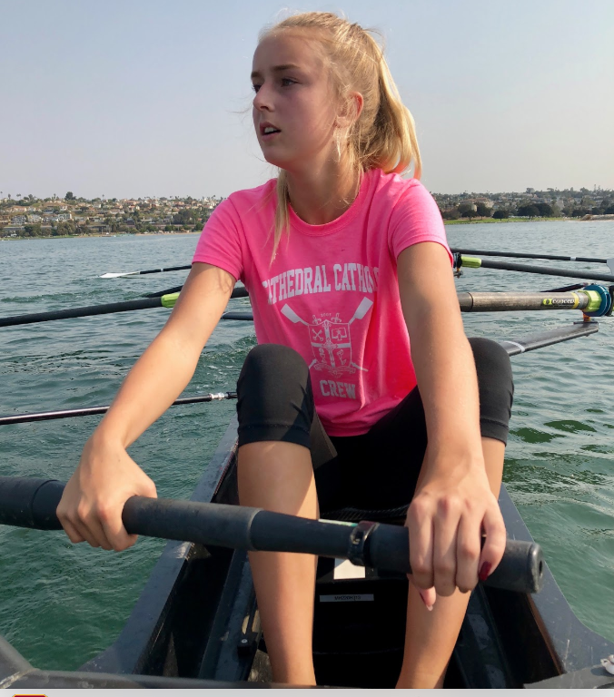 Chloe Ewart ‘22, a member of the CCHS girls’ novice crew team, rows during Sunday morning’s San Diego Fall Classic regatta in Mission Bay. After months of practice and strength training, the girls novice 8-person boat worked together to place eighth against crews from western U.S. 