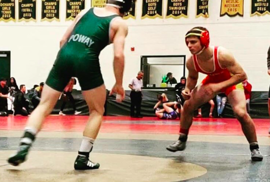 Nico Salmeri ‘21 prepares to take down his opponent in a match earlier this year. 