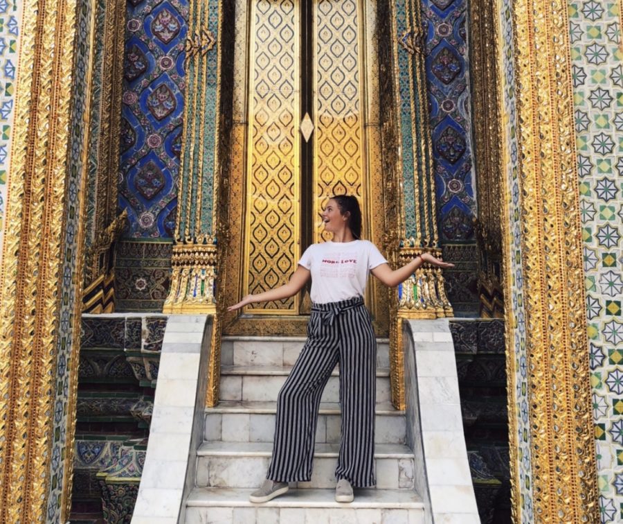Maddie Battiata ‘20 poses in front of unique architecture in Bangkok, Thailand. 