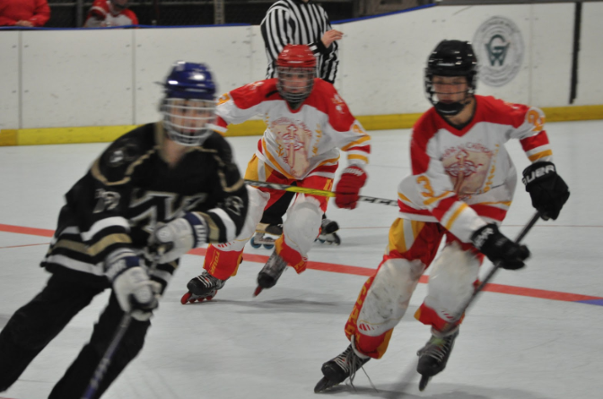 Quinn Conway ‘22 (#23) charges toward a Westview High School player with teammate Henry Allen 21 (#3) close behind. Although they put in a good effort, the Dons came up short during this game, losing 8-2 to Westview. 