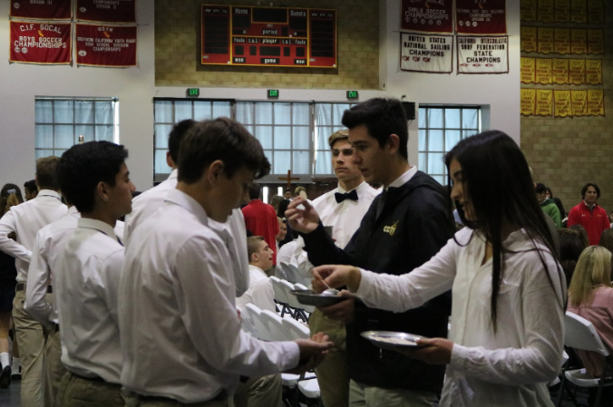 Cathedral Catholic High School comes together as a community for liturgy on Tuesday morning, where Father Martin Latiff led the mass for students, faculty, and parents. 