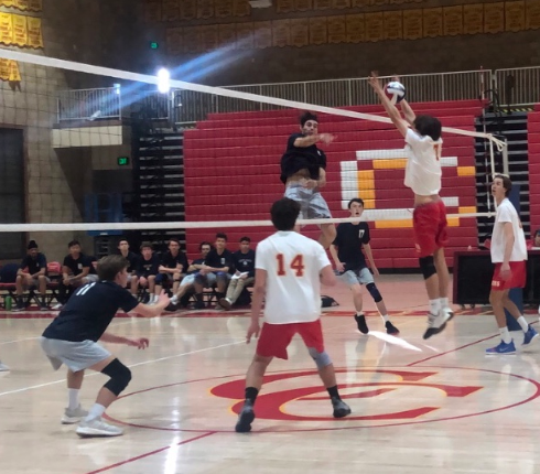 Cathedral Catholic High School student Greg Baglio ‘21 and the rest of the varsity boys volleyball team take on their rivals Saint Augustine High School. The team lost a tough match 2-3, which team members hope will inspire them to work even harder for their upcoming matches. 