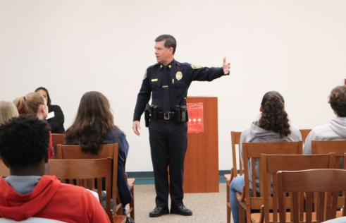 Lieutenant Scott Wahl of the San Diego Police Department delivers a speech regarding his life as a police officer in the Academic Center as part of Friday’s Career Day presentations. Career Day helped CCHS juniors learn about professions in various fields such as Education, Health, Engineering, Arts, and Law Enforcement.

