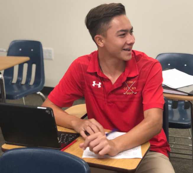 Dylan Vizanko ‘20, a future University of California Los Angeles golf player, always studies with a smile during his gold five geometry class. 
