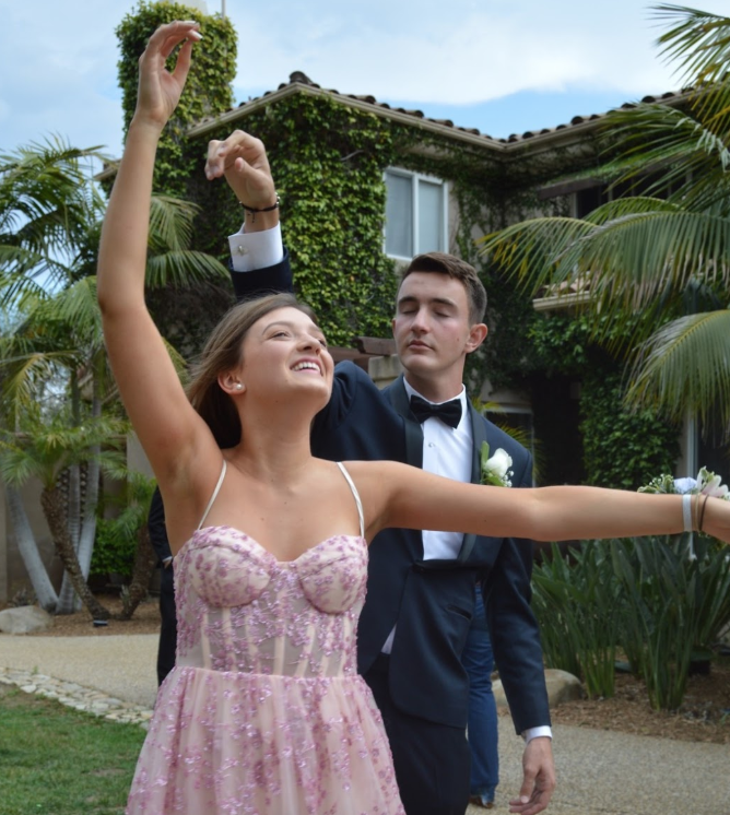 Ben Nash ‘19 twirls Megan Monroe ‘19 to capture a photo before Saturday’s “Let’s Have A Mari-Time” themed Prom. The annual CCHS Prom took place  this year at SeaWorld, where upperclassmen  rode the newest roller coaster, the Electric Eel, and danced the night away with classmates.
