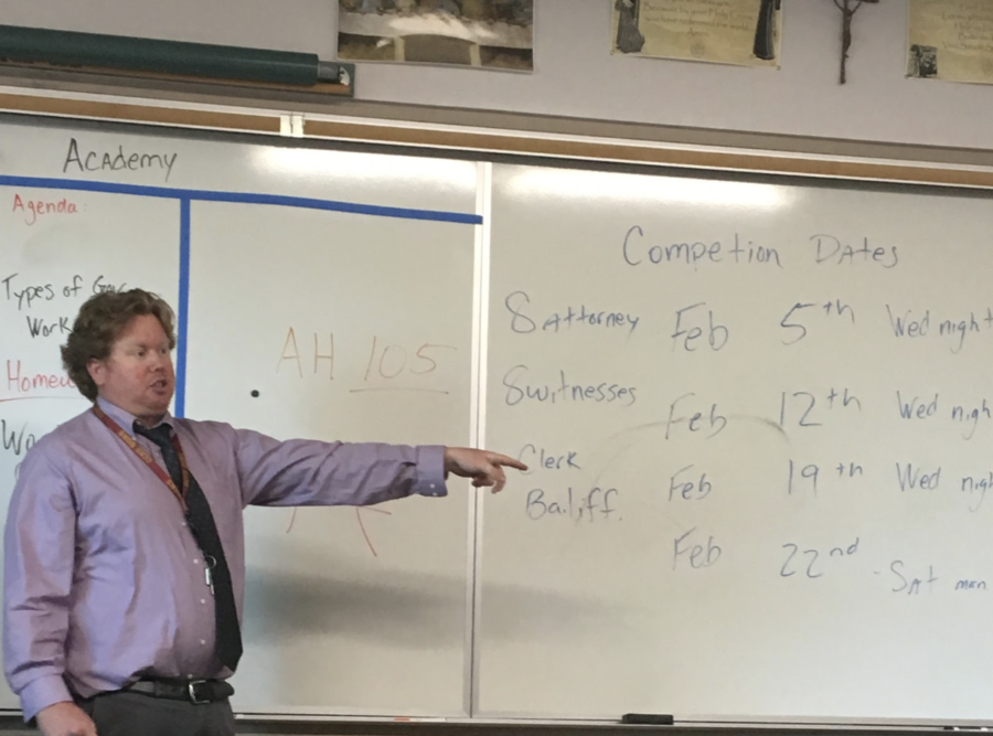 Mr. Danny Collins points out competition dates at the informational meeting for CCHS Mock Trial held Tuesday. Interested students were informed about this year’s trial, upcoming meetings, and available positions for tryouts.