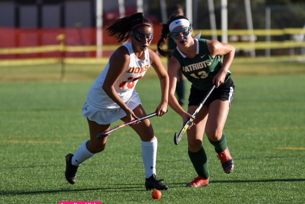 Mia Koczur ‘21 (left) fights for the ball in the Don’s field hockey match against Patrick Henry High School last November. The Dons lost the game 2-0, and both points were scored in the second half of regulation. 