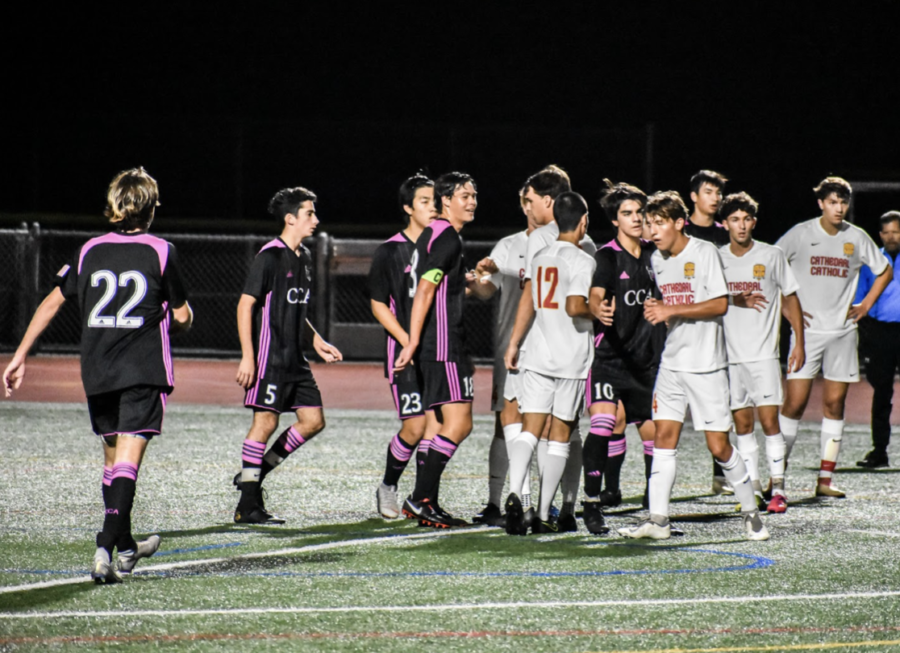 The+CCHS+varsity+soccer+team+shakes+hands+with+Canyon+Crest+Academy+after+a+match.