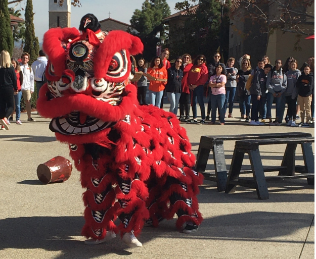 Students watch a traditional Chinese lion dance in the quad in celebration of Chinese New Year. In Chinese culture, lion dances are performed to bring good fortune and to ward off evil spirits.