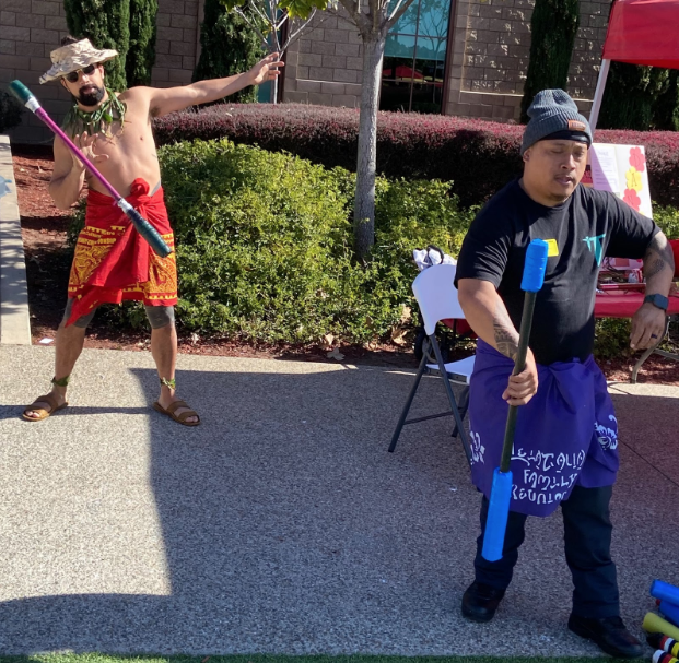 Hawaiian traditional fire dancers perform at lunch of Pacific Islander day of Catholic Schools week. In celebration of various cultures, Principal Dr. Kevin Calkins and the CCHS administration elected to honor a culture of a particular ethnicity each day of Catholic Schools week. Events occurred at lunch, like this traditional dance, which celebrated each culture’s unique experiences.
