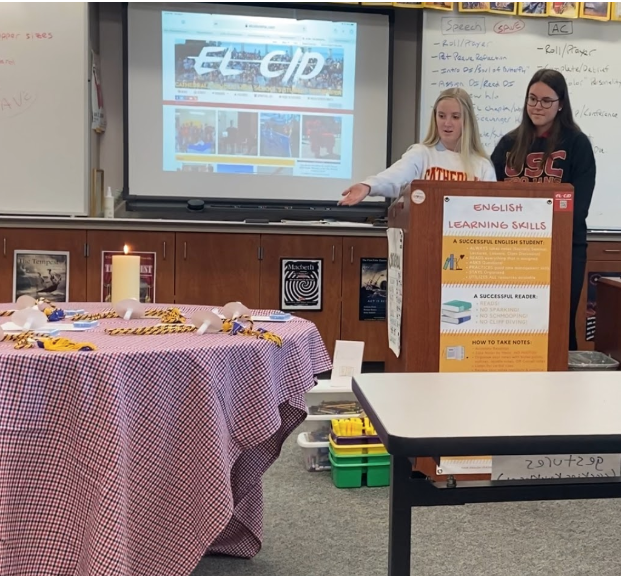 Savannah Dupper ‘20 explains the candle of truth at the Quill and Scroll International Journalism Honor Society CCHS chapter induction ceremony. Dupper, president and cofounder of QSHS at CCHS, instructed each prospective member to light their candle with the candle of truth, symbolizing a member’s dedication to journalistic principles and each member’s future prioritization of the truth.