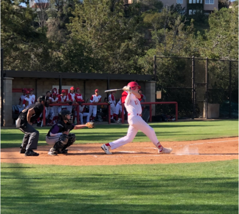Charlie Mirer ‘22 hits a ground ball for a base hit early this month. The CCHS junior varsity baseball team went on to beat their opponent, Santana High School, 5-4, continuing their undefeated winning streak.