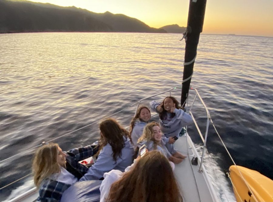 Hannah Wong sits at the peak of the boat with her teammates, oblivious to the tragedy ahead. 