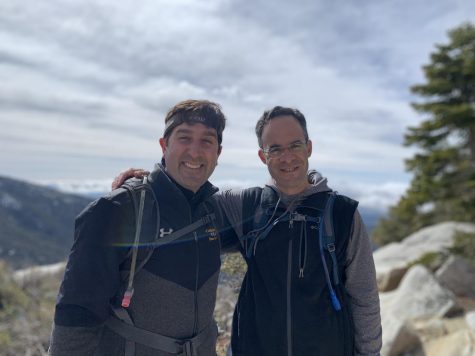 Father Martin and Father Paul pose for a picture while out on a hike. 