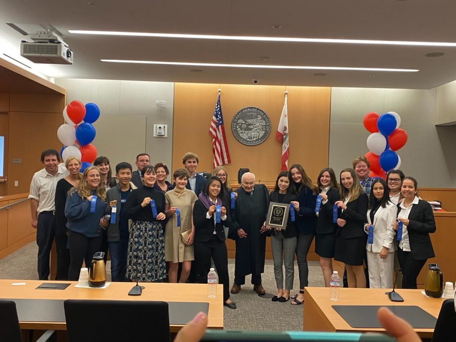 Cathedral Catholic’s Mock Trial poses after their county win in 2020