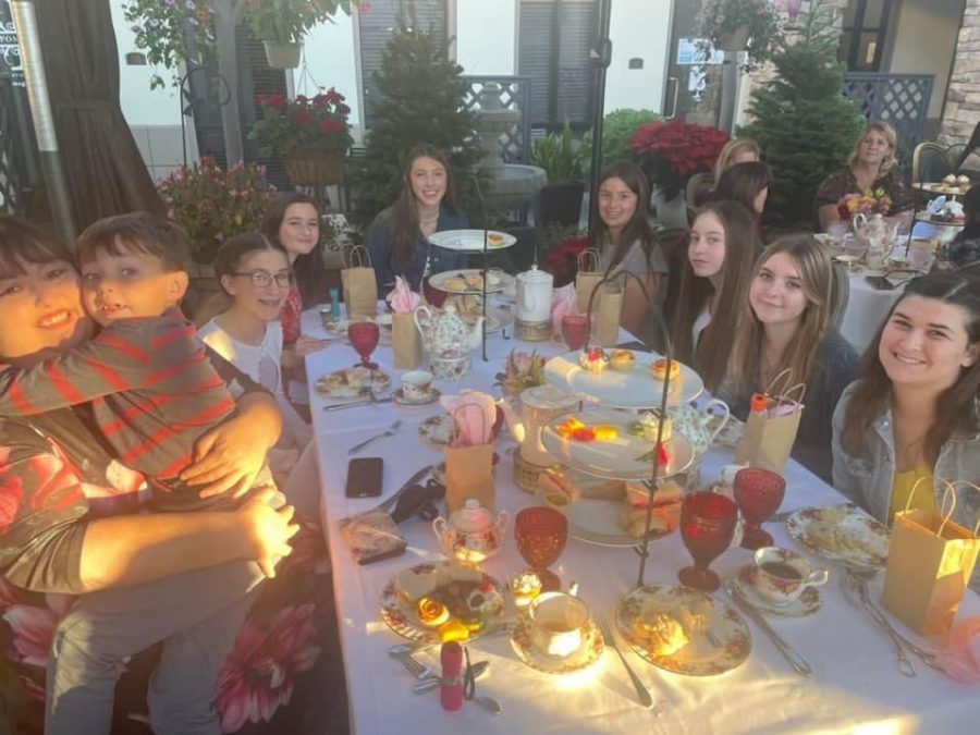 The CCHS girl scout troop attended a tea party.  The troop often attends events like this one to bond with one another. 