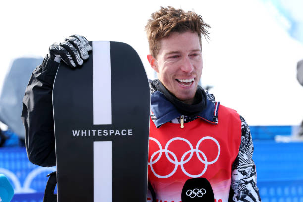 The five time Olympian and three time gold medalist, Shaun White and his snowboard after hitting the halfpipe for the last time at the Beijing 2022 Winter Olympic Games. He stepped down as a legend, with so much gratitude and love for the support he has been shown on the journey. 