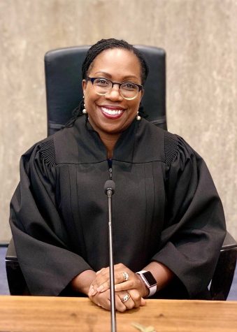 Justice Ketanji Brown Jackson poses for her Supreme Court Justice portrait. 