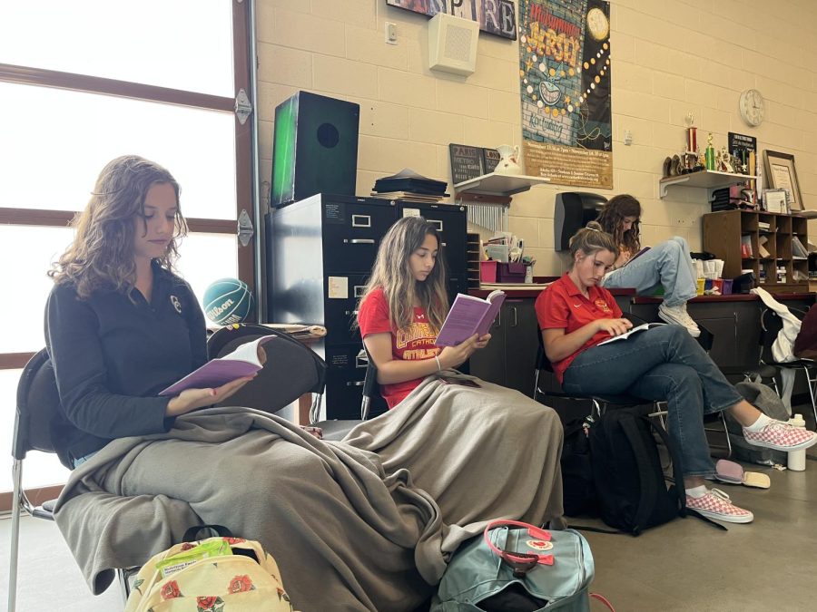 In preparation for the upcoming show, Lost Girl, Morgan Stack, Kayleigh Correia and Megan Geall read the script during a rehearsal. Until lines are memorized and blocked rehearsal is comprised of read throughs with the cast and director, Ms. Wilson.