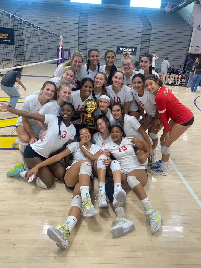 In this photo of our varsity girls volleyball team, they smile with pride after being named #1 in the nation!