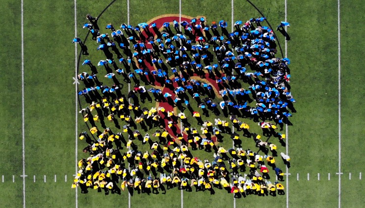 Students came together to form the Ukrainian flag as a union to support Ukraine.
