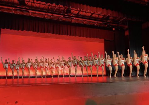 Photo of CCDT famous kickline. Photo from last year’s winter concert, “Making Spirits Bright.”