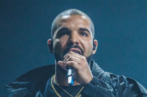 Drake performs for fans in July of 2016. The singer is currently being sued Vogue for his album art