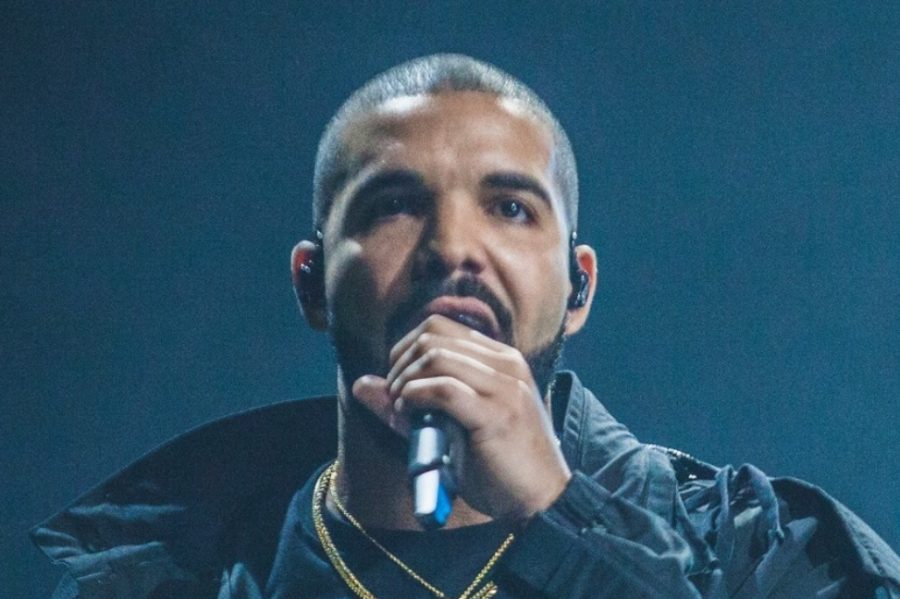 Drake performs for fans in July of 2016. The singer is currently being sued Vogue for his album art