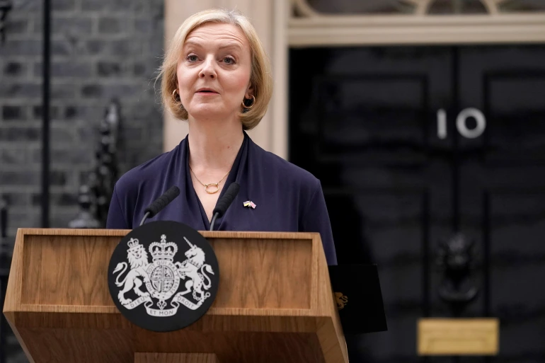 Photo of UK Prime Minister Liz Truss announcing her resignation. Truss resigned as a result from financial pressure unfolding while she was in office.